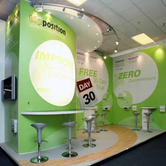 Awesome indoor exhibition display and exhibition stand with bar stool type chairs for customers